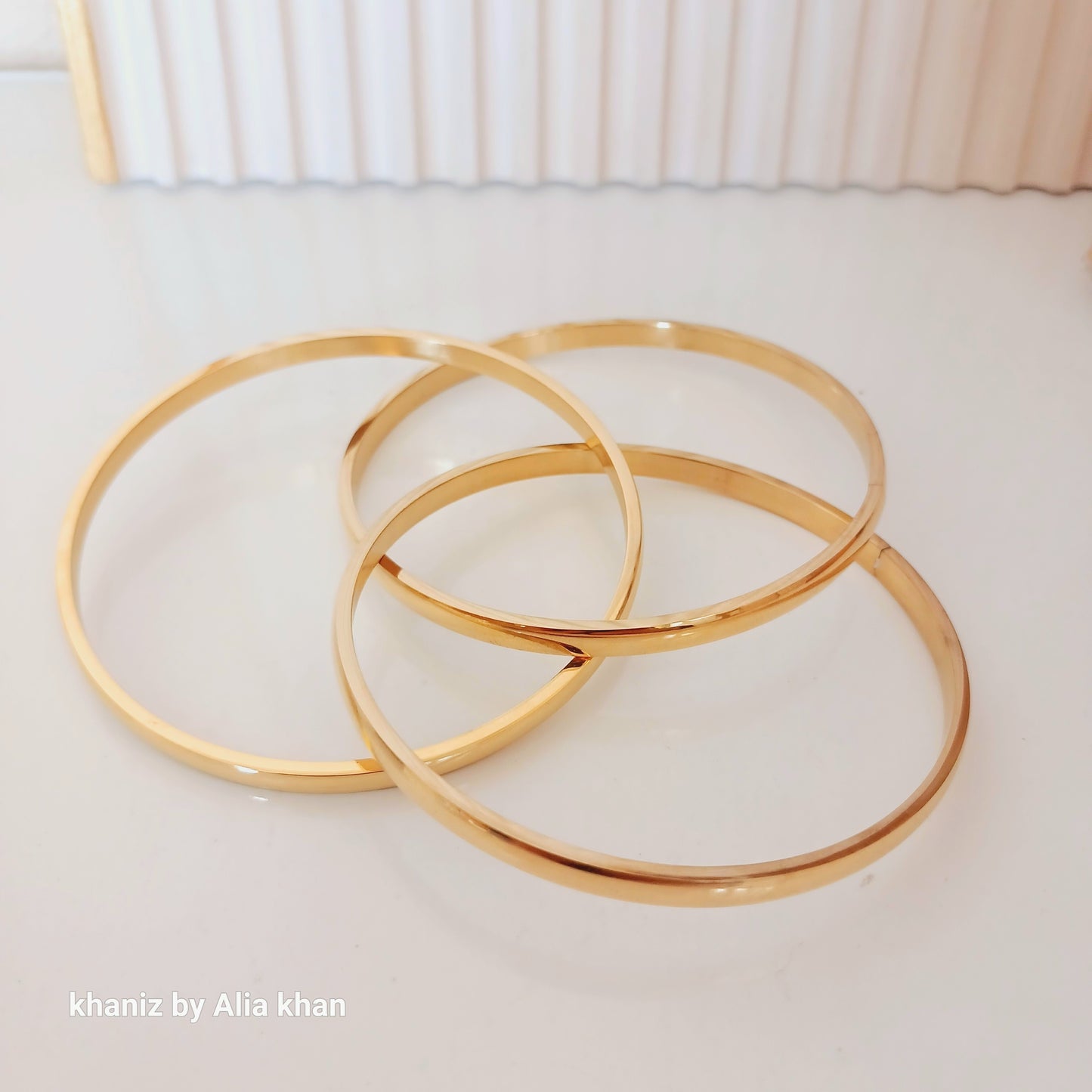Clutter Golden Bangles