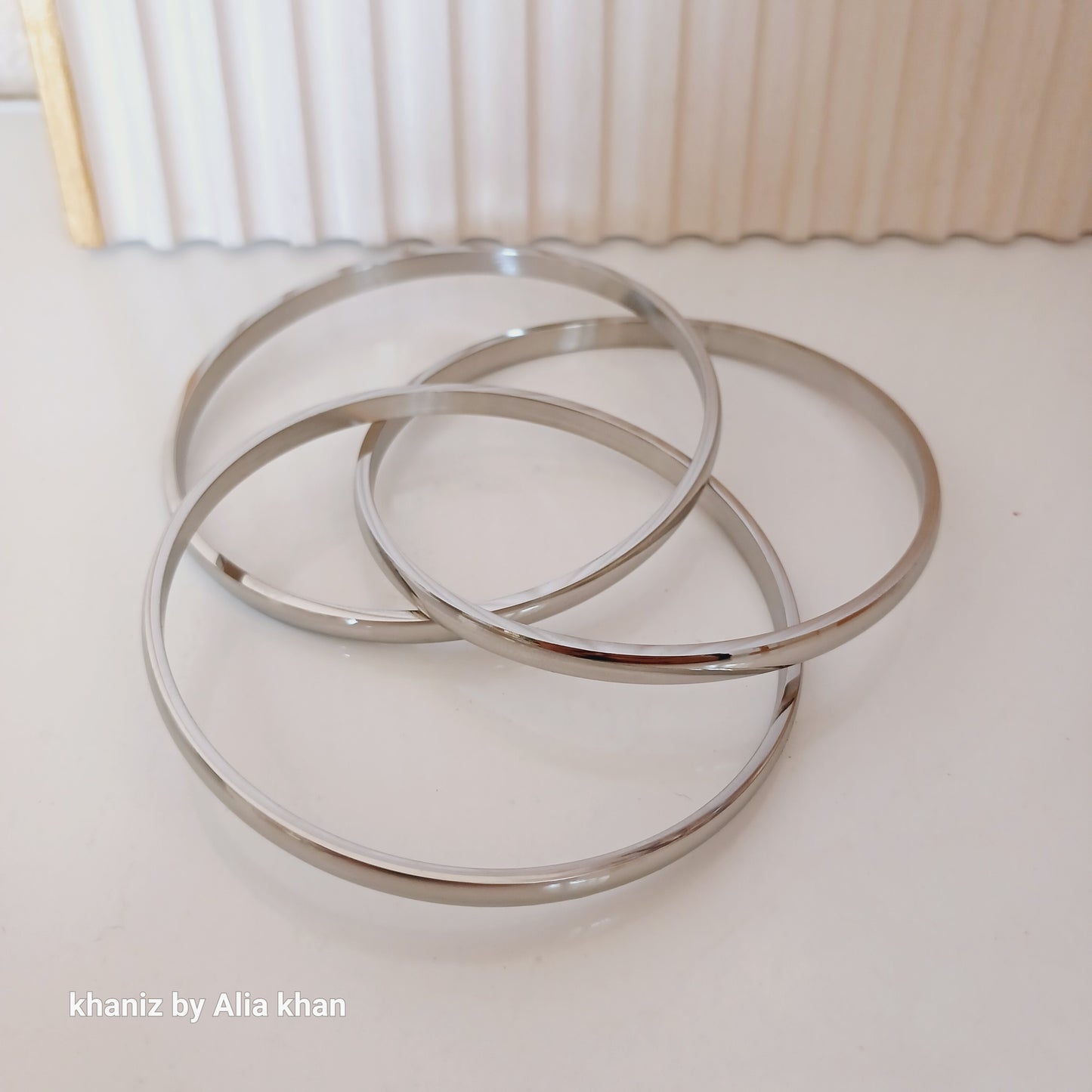 Clutter Silver Bangles