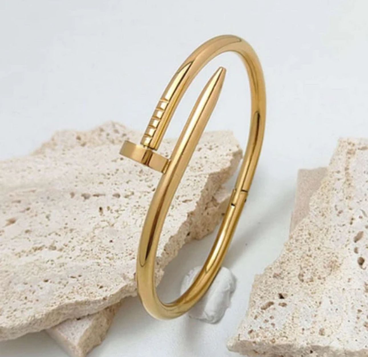 Nail Cartier handcuff