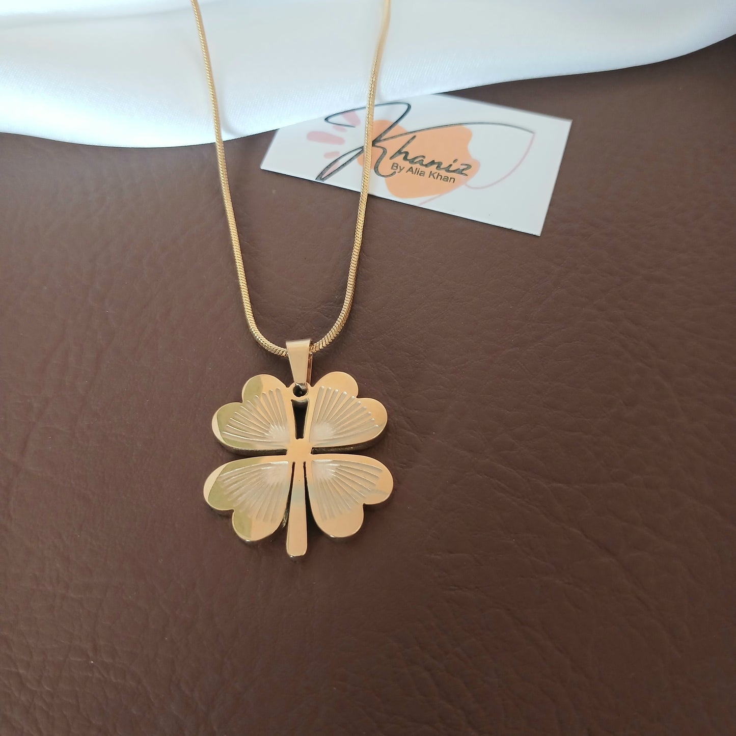 Gilded clover long chain pendant