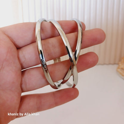 Clutter Silver Bangles