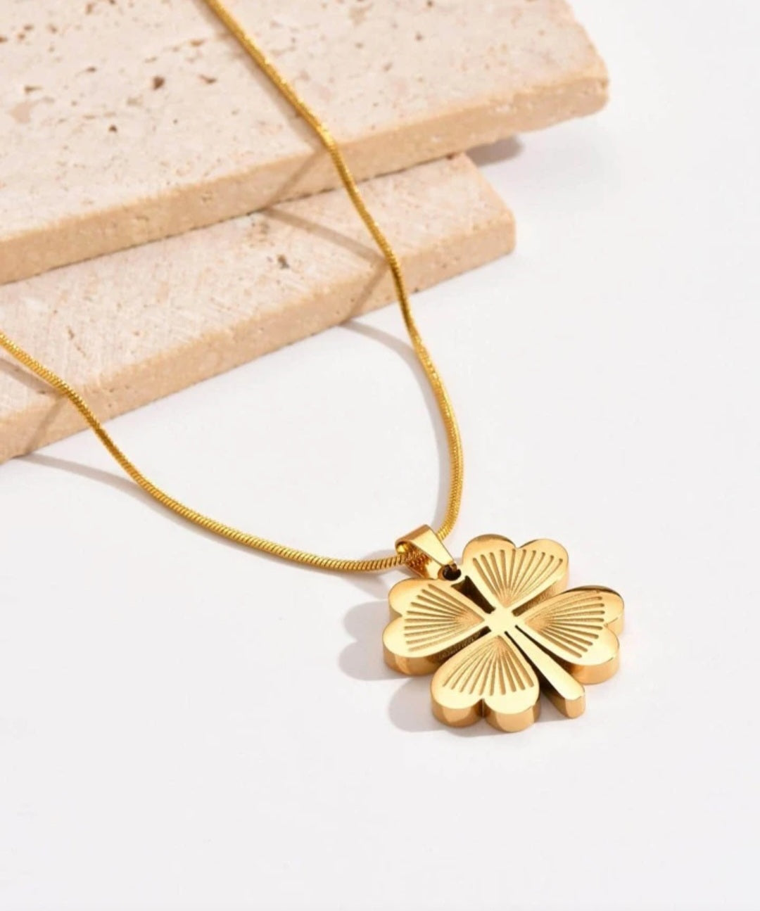 Gilded clover long chain pendant